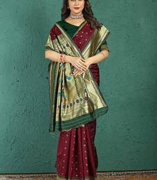 Maroon banarasi silk blend saree with zari weaving & dark green paithani border