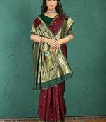 Maroon banarasi silk blend saree with zari weaving & dark green paithani border