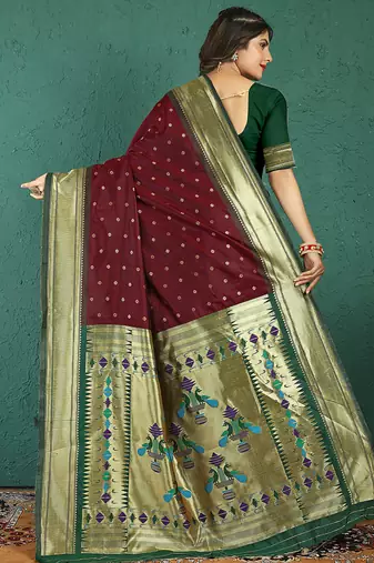 Maroon banarasi silk blend saree with zari weaving & dark green paithani border