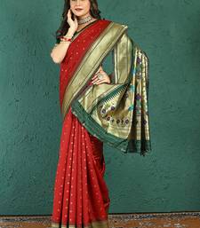 Red banarasi silk blend saree with zari weaving & dark green paithani border