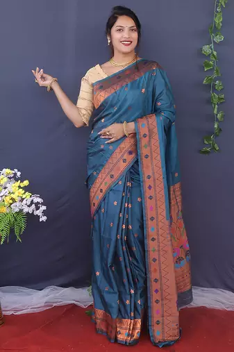 Teal blue banarasi silk blend saree with copper zari butti & geometric woven border