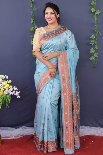 Sky blue banarasi silk blend saree with copper zari butti & geometric woven border