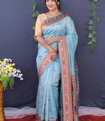Sky blue banarasi silk blend saree with copper zari butti & geometric woven border