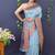 Sky blue banarasi silk blend saree with copper zari butti & geometric woven border