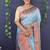 Sky blue banarasi silk blend saree with copper zari butti & geometric woven border