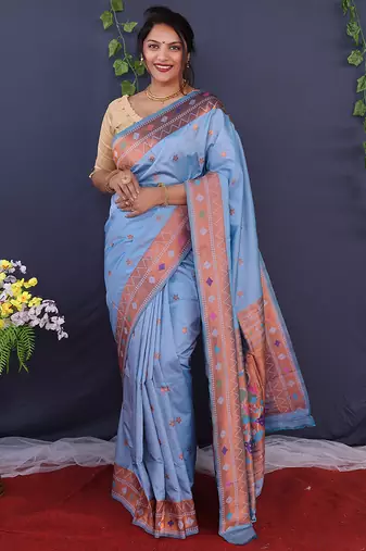 Sky blue banarasi silk blend saree with copper zari butti & geometric woven border