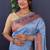 Sky blue banarasi silk blend saree with copper zari butti & geometric woven border