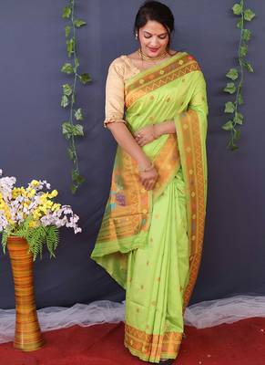 Light green banarasi silk blend saree with copper zari butti & geometric woven border 2