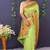 Light green banarasi silk blend saree with copper zari butti & geometric woven border