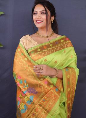 Light green banarasi silk blend saree with copper zari butti & geometric woven border 4