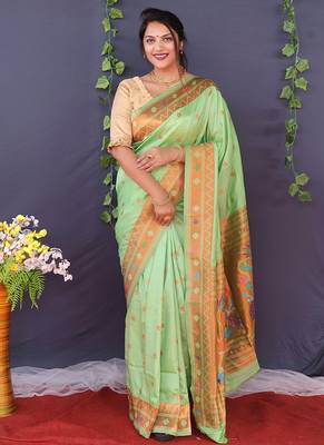 Mint green banarasi silk blend saree with copper zari butti & geometric woven border 1