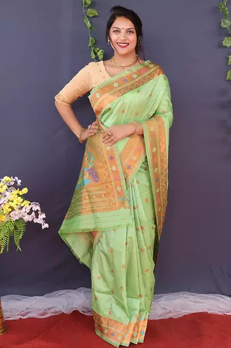 Mint green banarasi silk blend saree with copper zari butti & geometric woven border
