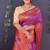 Magenta purple banarasi silk blend saree with copper zari butti & geometric woven border