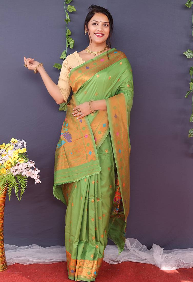 Leaf green banarasi silk blend saree with copper zari butti & geometric woven border
