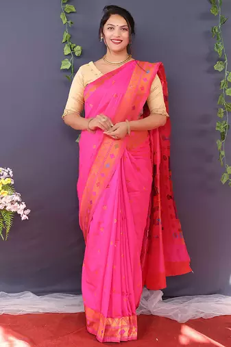 Rani pink banarasi silk blend saree with copper zari butti & geometric woven border