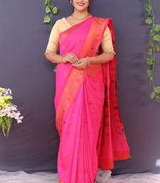 Rani pink banarasi silk blend saree with copper zari butti & geometric woven border