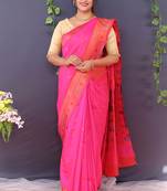 Rani pink banarasi silk blend saree with copper zari butti & geometric woven border