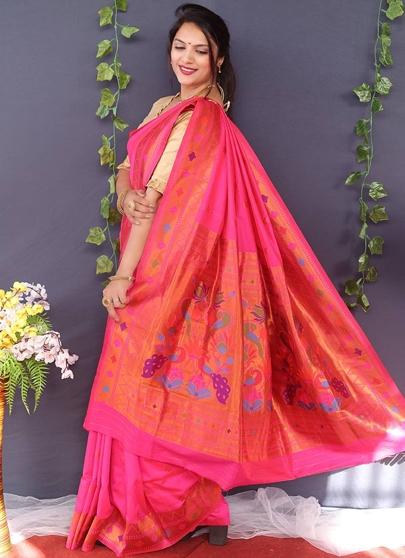 Rani pink banarasi silk blend saree with copper zari butti & geometric woven border