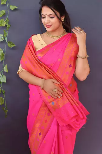 Rani pink banarasi silk blend saree with copper zari butti & geometric woven border