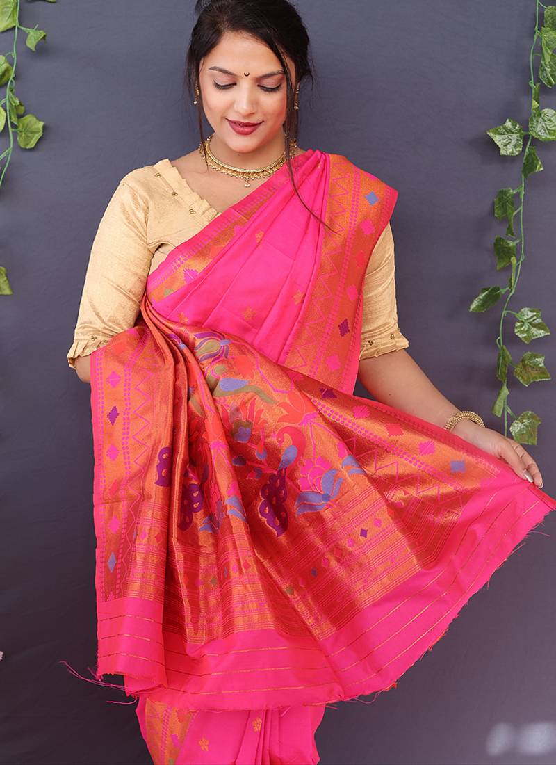 Rani pink banarasi silk blend saree with copper zari butti & geometric woven border