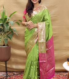 Light green banarasi silk blend saree with contrast border & rich zari weaving