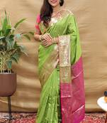 Light green banarasi silk blend saree with contrast border & rich zari weaving