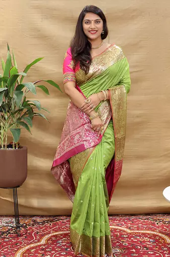 Light green banarasi silk blend saree with contrast border & rich zari weaving