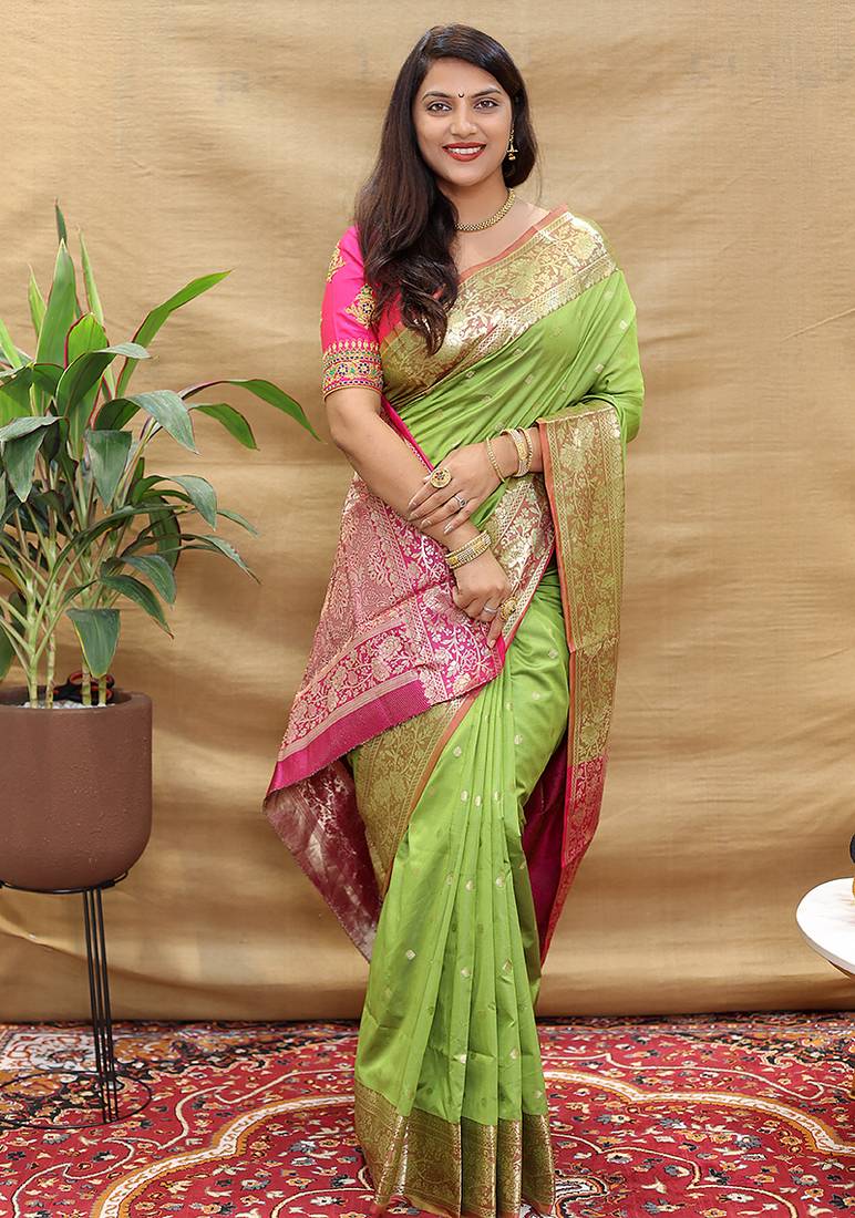 Light green banarasi silk blend saree with contrast border & rich zari weaving