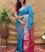 Sky blue banarasi silk blend saree with contrast border & rich zari weaving