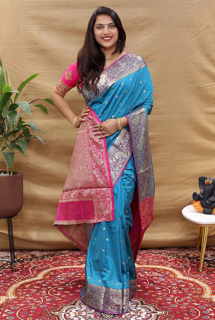 Sky blue banarasi silk blend saree with contrast border & rich zari weaving