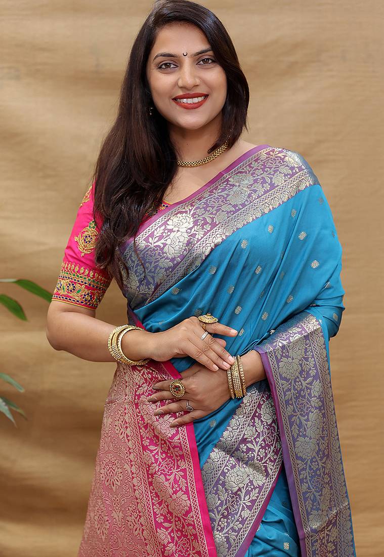Sky blue banarasi silk blend saree with contrast border & rich zari weaving