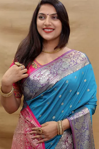 Sky blue banarasi silk blend saree with contrast border & rich zari weaving
