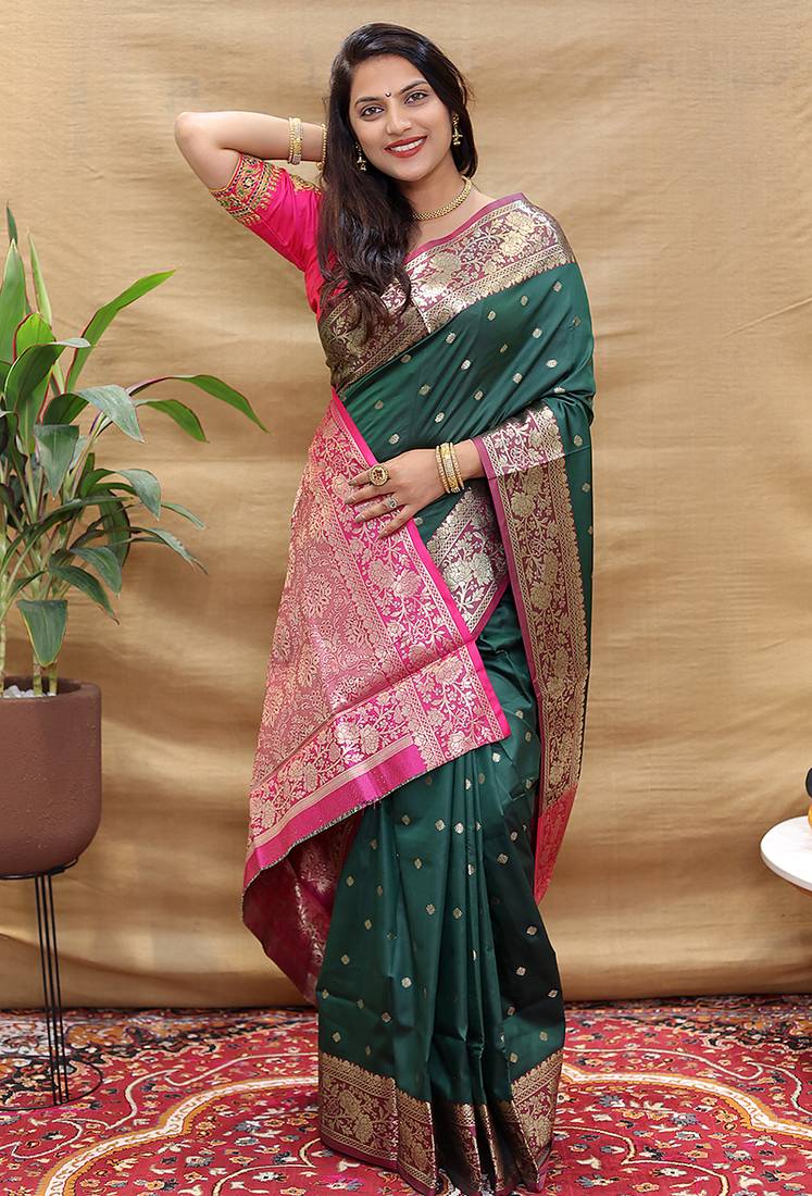 Bottle green banarasi silk blend saree with contrast border & rich zari weaving
