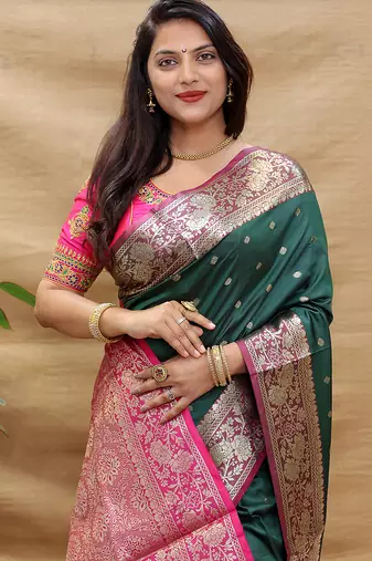 Bottle green banarasi silk blend saree with contrast border & rich zari weaving