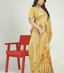 Light yellow banarasi silk blend saree with multicolor floral zari weaving