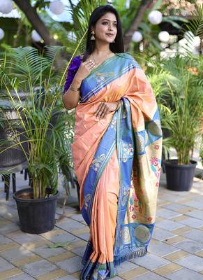 Peach paithani silk blend saree with contrast border & zari floral weaving 1