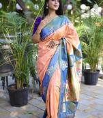 Peach paithani silk blend saree with contrast border & zari floral weaving