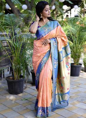 Peach paithani silk blend saree with contrast border & zari floral weaving 3