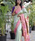Pastel mint green paithani silk blend saree with contrast border & zari floral weaving