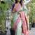 Pastel mint green paithani silk blend saree with contrast border & zari floral weaving