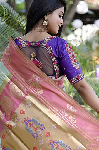 Pastel mint green paithani silk blend saree with contrast border & zari floral weaving