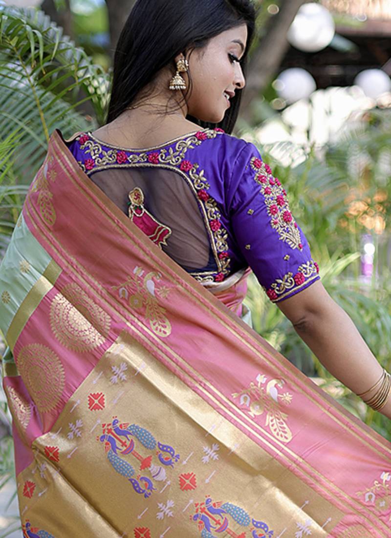 Pastel mint green paithani silk blend saree with contrast border & zari floral weaving