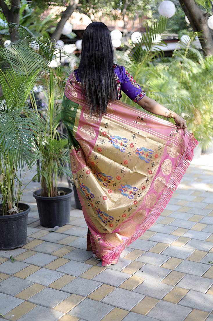 Dark green paithani silk blend saree with contrast border & zari floral weaving