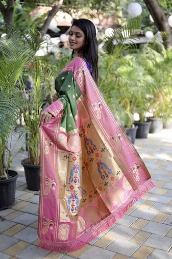 Dark green paithani silk blend saree with contrast border & zari floral weaving