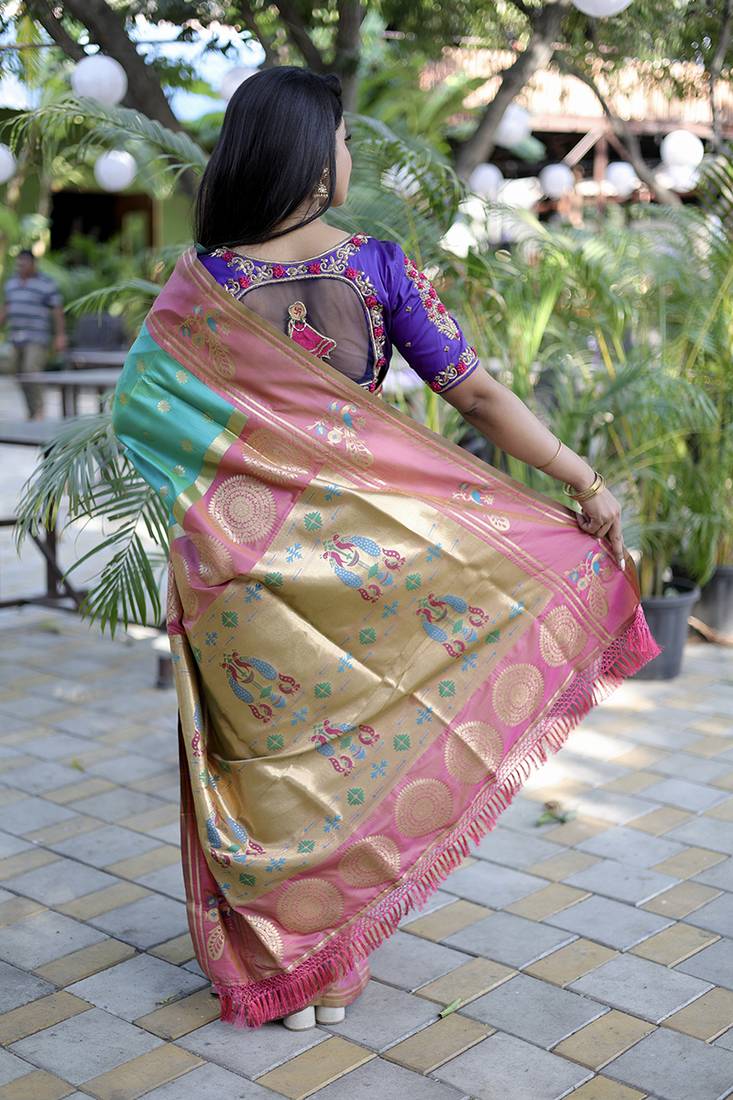 Aqua blue paithani silk blend saree with contrast border & zari floral weaving