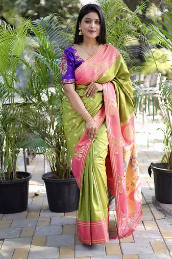 Light green paithani silk blend saree with contrast border & zari floral weaving