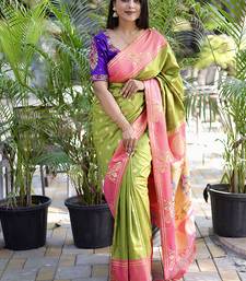 Light green paithani silk blend saree with contrast border & zari floral weaving