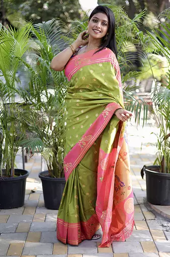 Light green paithani silk blend saree with contrast border & zari floral weaving