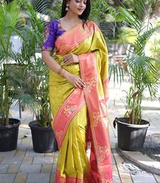Mustard yellow paithani silk blend saree with contrast border & zari floral weaving