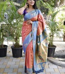 Coral paithani silk blend saree with contrast border & zari floral weaving